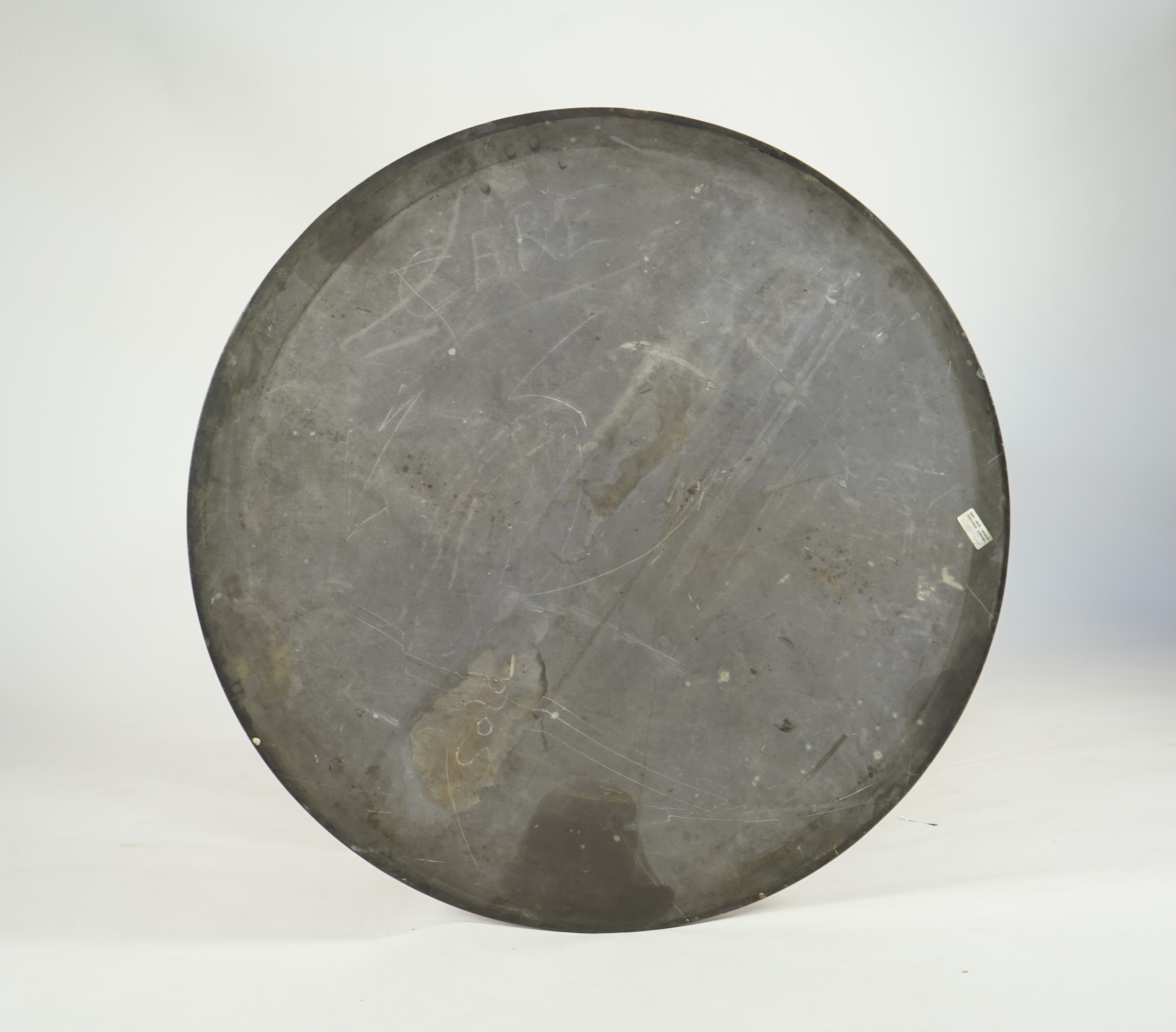 A George IV parcel gilt mahogany circular slate top centre table